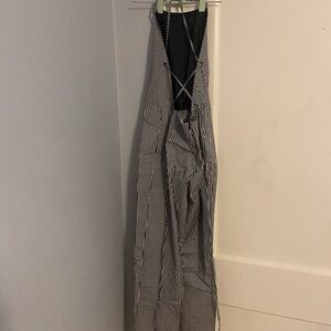 Urban Outfitters - Silence + Noise . black and white stripped jumpsuit. Size M